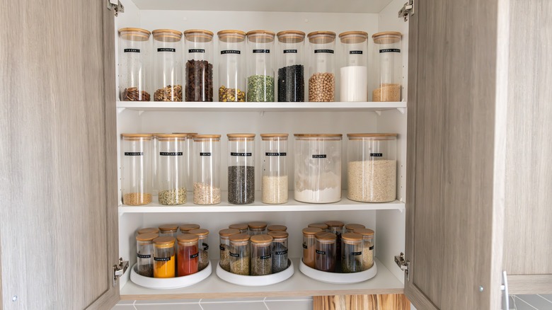 organized pantry with matching jars