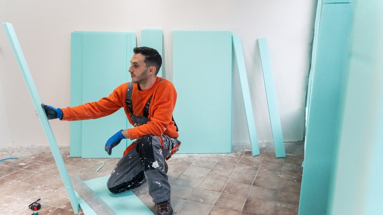 DIYer looking at foam insulation