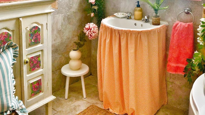 Stylish bathroom with statement sink skirt in a bright gingham fabric