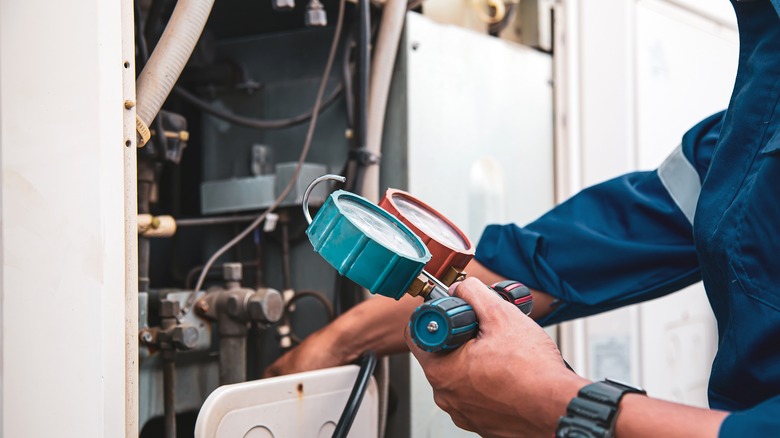 Man installing HVAC system