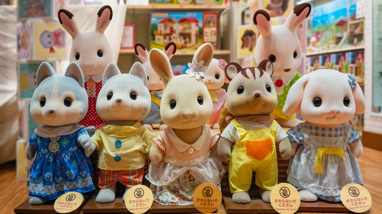 collection of Calico Critter dolls