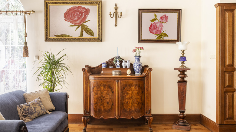 An antique chest in a styled, airy living room.