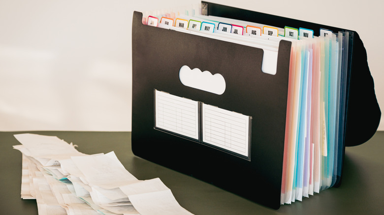 File organizer with color coded files on a table