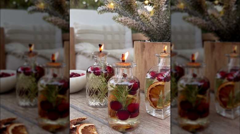 Scented oil candles in fancy bottles