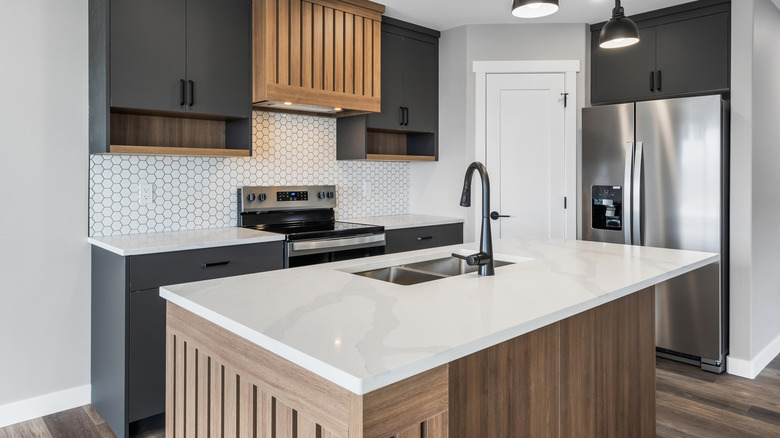 A modern kitchen with simple eased-edge countertops.