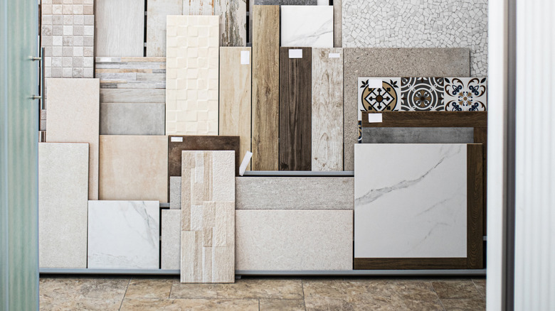 Sample tiles on display in the kitchen design showroom.