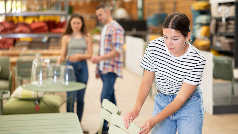 People shopping for outdoor furniture