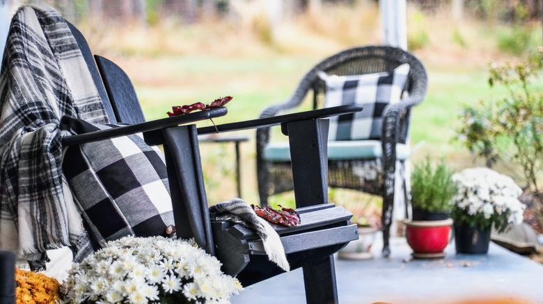 Patio furniture with black and white buffalo checkered blankets