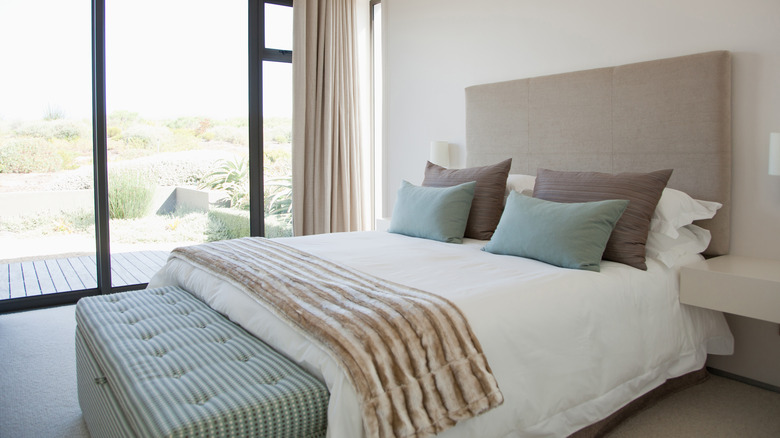Bedroom with made bed