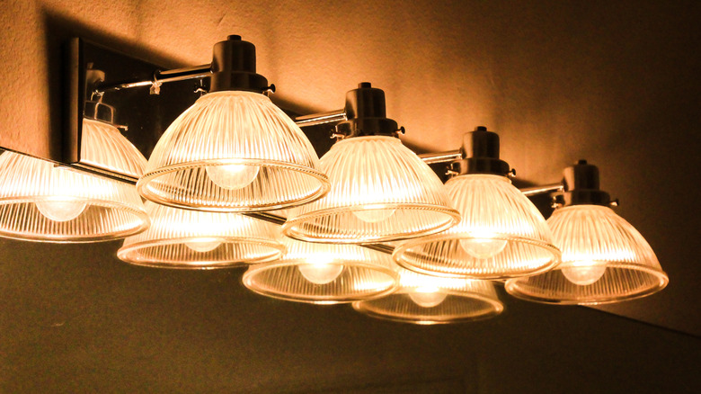 Close up of overhead bathroom lighting