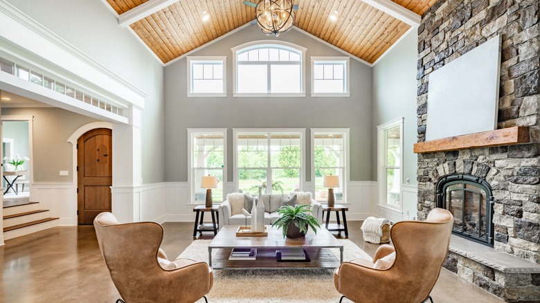Living room with wood-paneled ceiling