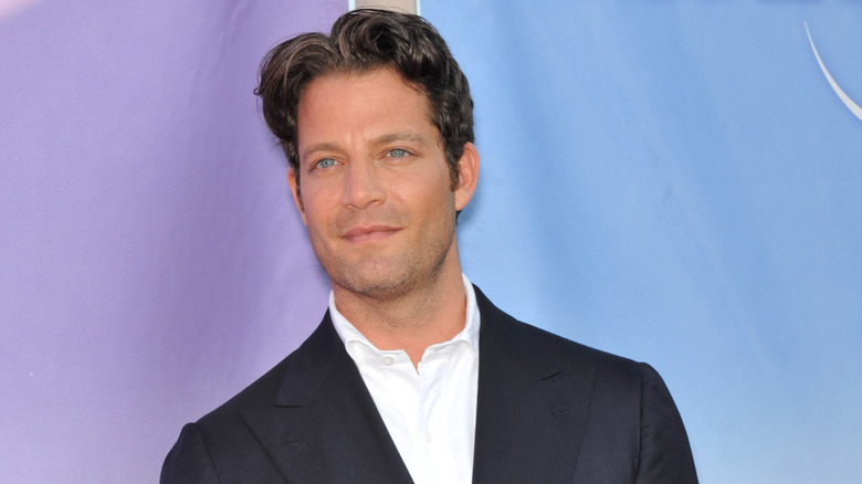 Nate Berkus smiling on the red carpet