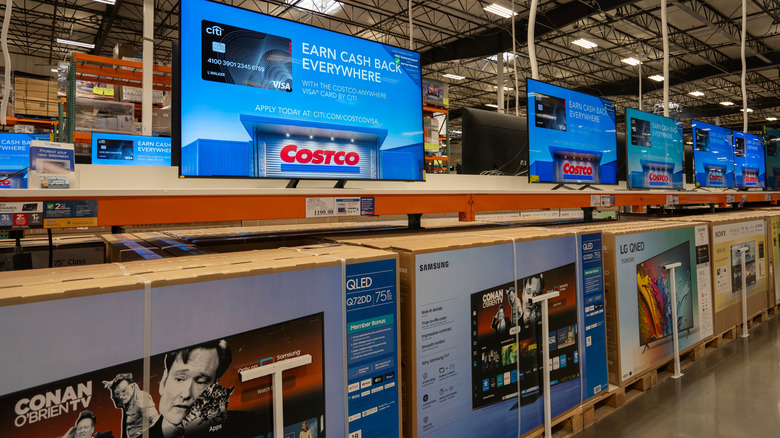 TVs displayed at a Costco store