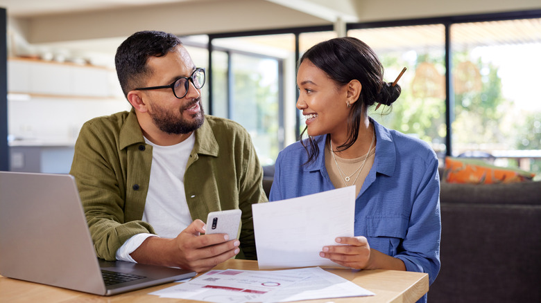 Couple closing a real estate deal