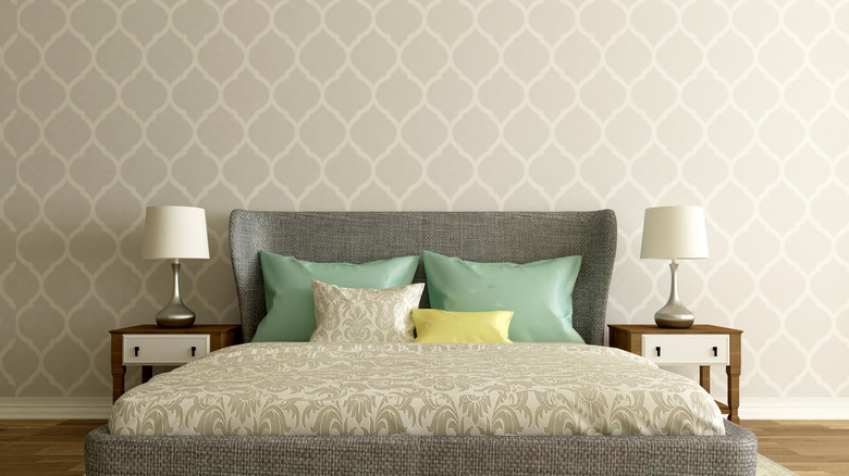A bedroom with wallpaper