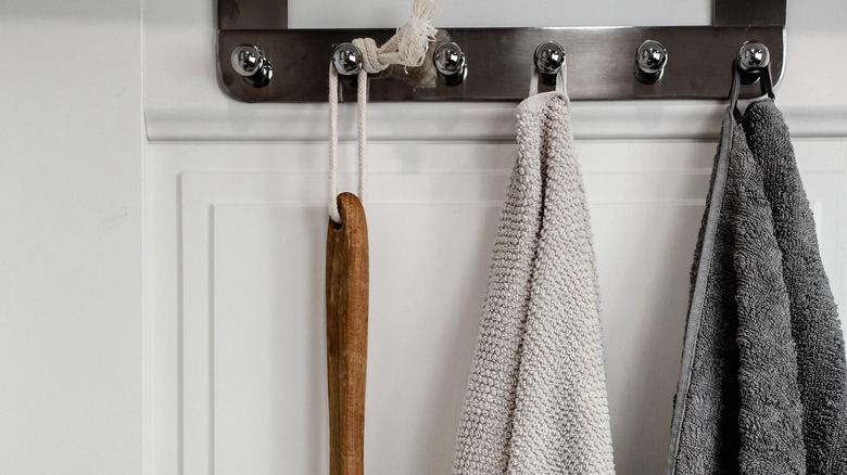 Hanging hooks over bathroom door