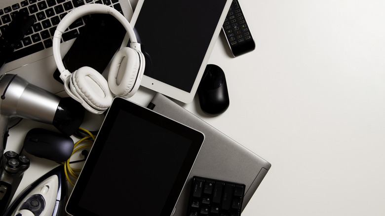 electronics piled together on counter