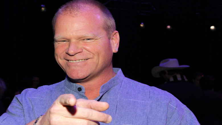 Headshot of a smiling Mike Holmes