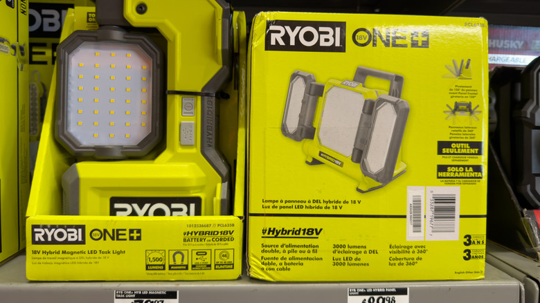 Official Ryobi products on the shelf in an authorized hardware store.