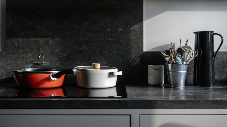 Two large pots on top of a stove
