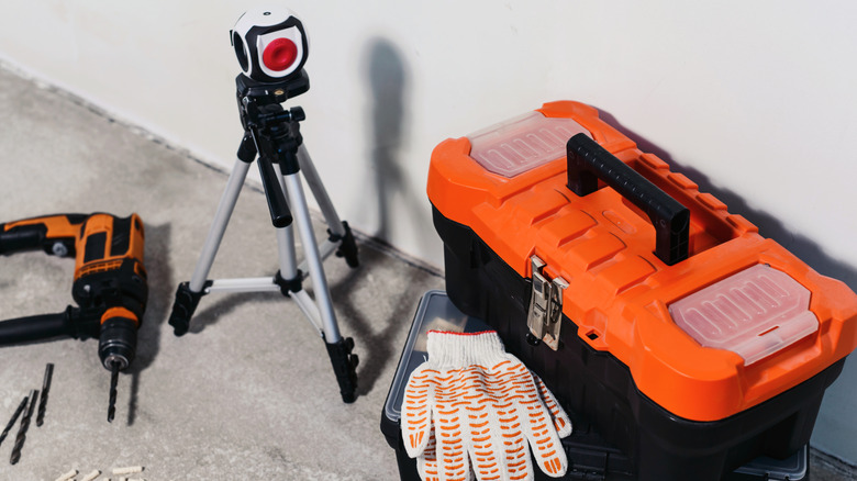 Laser level next to storage box