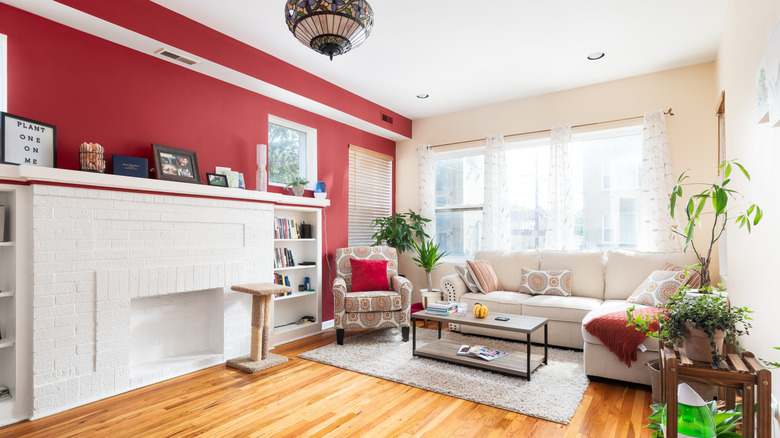 Room with red accent wall