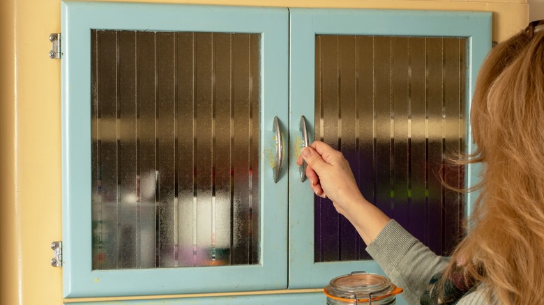 opening cabinet with glass doors