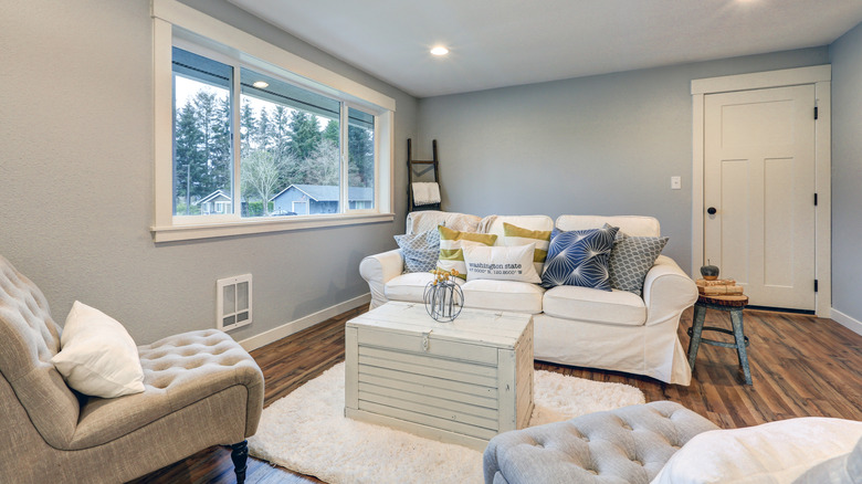 Living room with slip-covered sofa