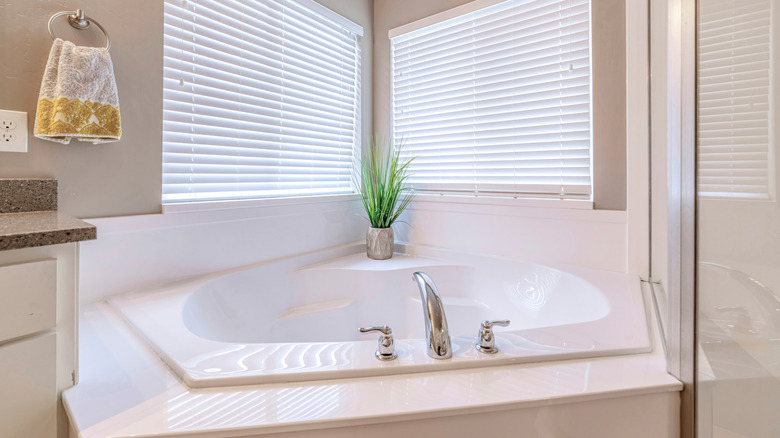 A built-in bathtub in a corner