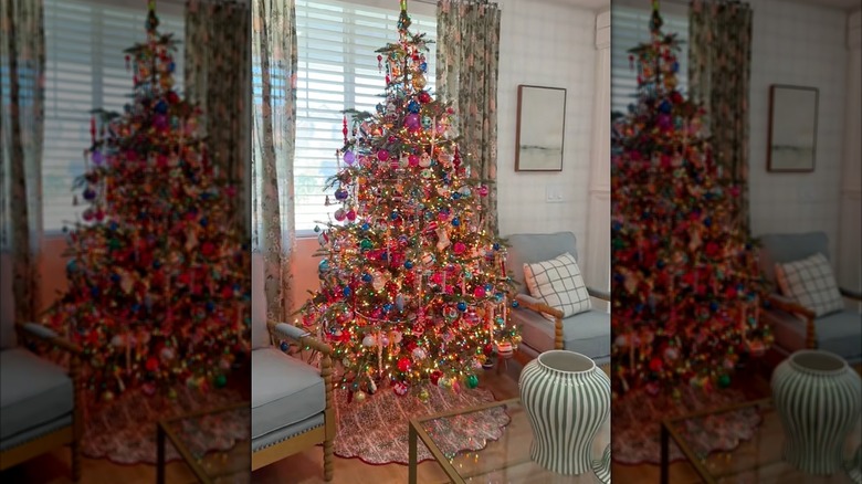 A colorful Christmas tree decorated with ornaments and tinsel.