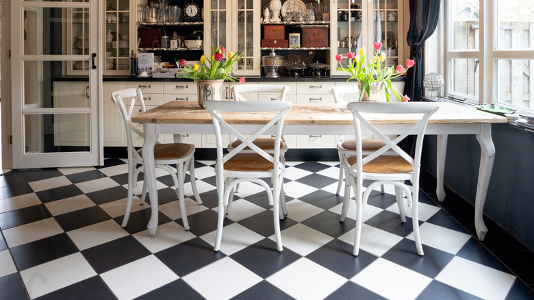 A stylish kitchen with checkered floors