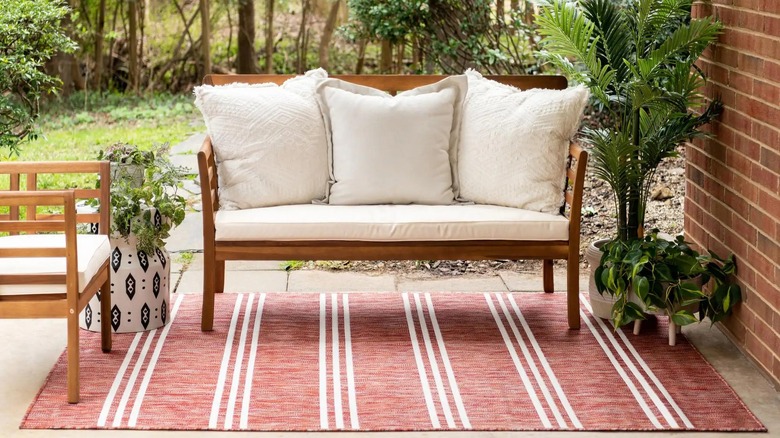 Striped patio rug with furniture