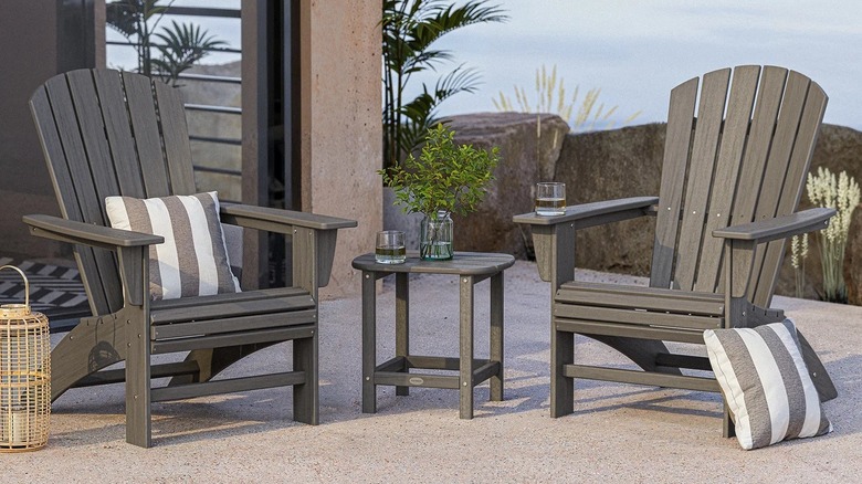 Adirondack chairs outdoors on a patio