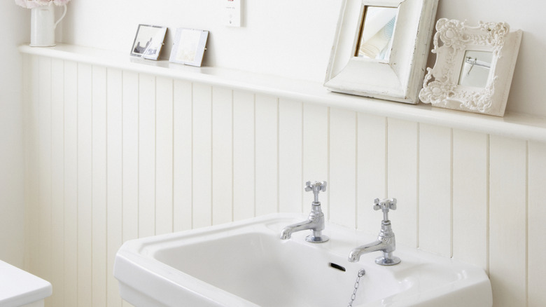 Bathroom ledge in a white bathroom
