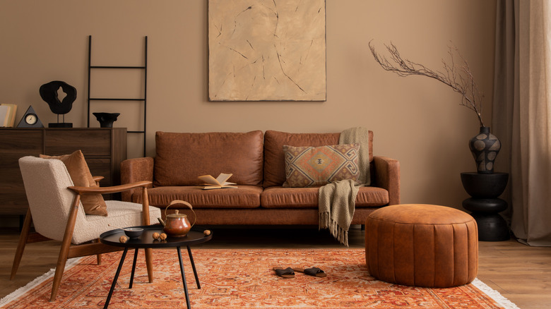 brown living room design with burnt orange details