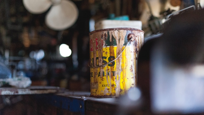 messy paint cans