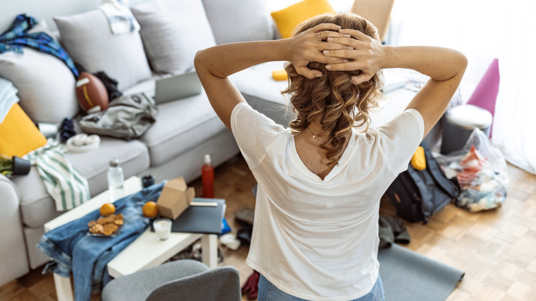 woman cleaning out clutter