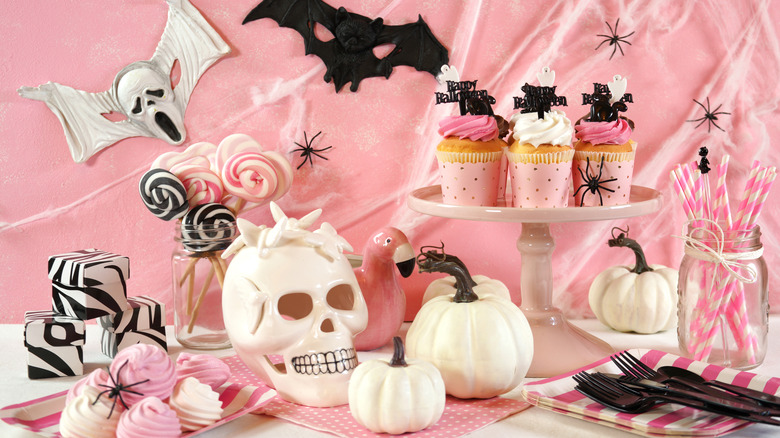 Pink table decorated for Halloween