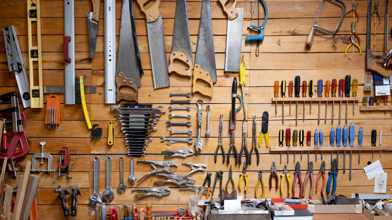 tools hanging on wall