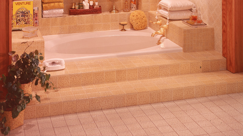Retro '80s bathroom interior with in ground tub