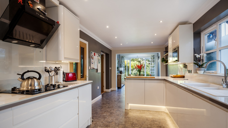 Glossy white cabinets in a kitchen