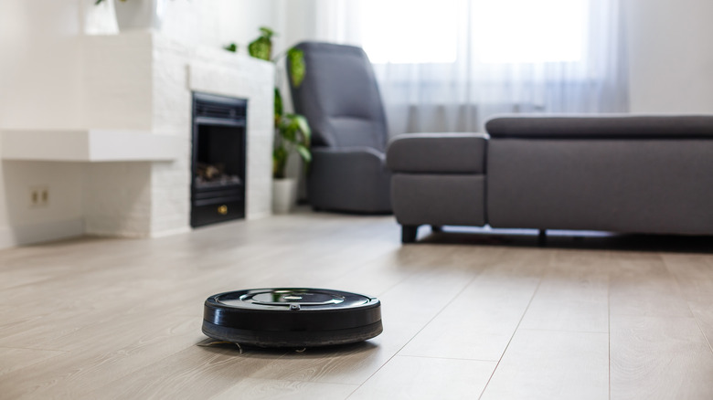 robotic vacuum cleaner on wood floor