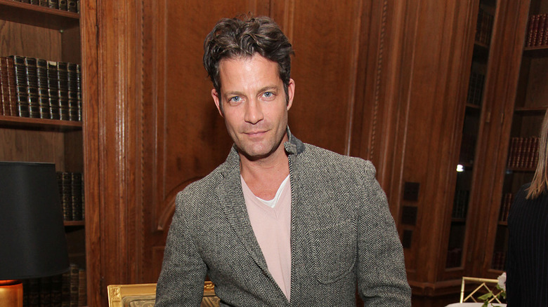 Nate Berkus poses at an event