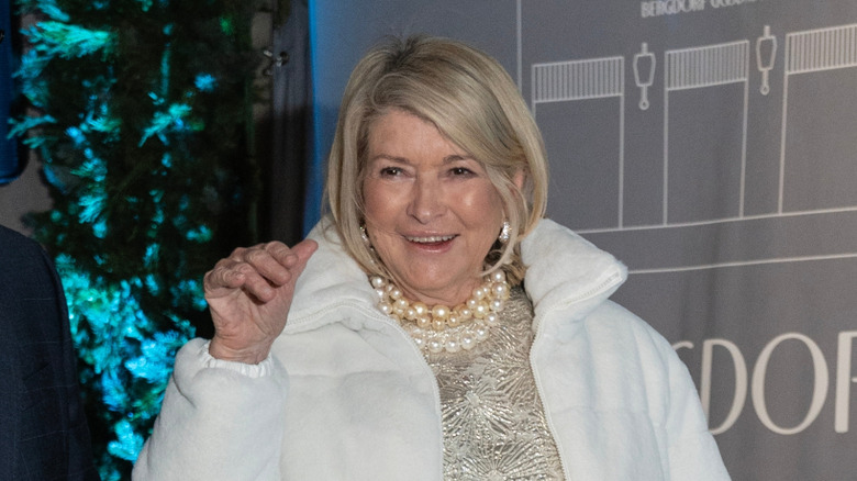 Matha Stewart wearing a thick white jacket on a red carpet