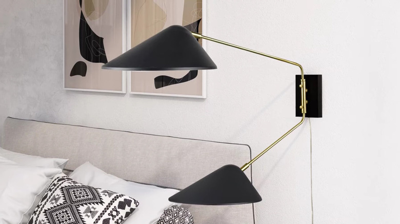 Double arm sconces on bedside