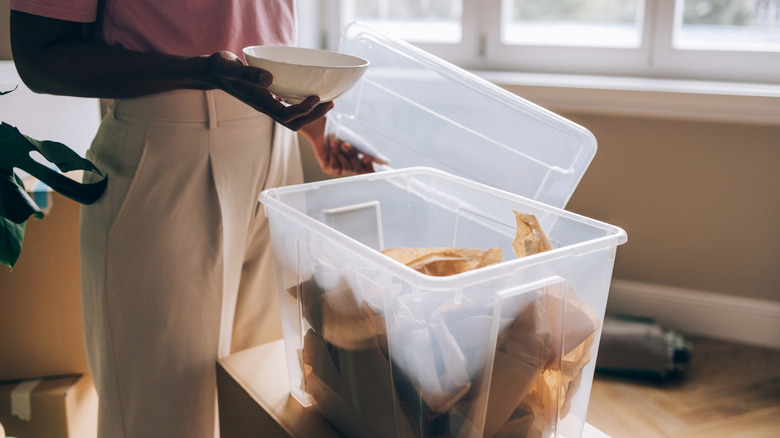Person uses clear storage to organize