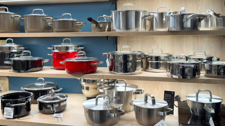 A variety of cookware on a store display
