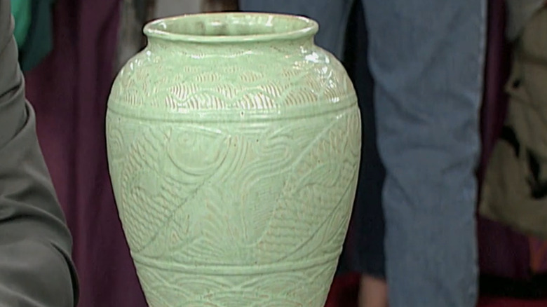 Light green Shearwater vase on a table at the Antiques Roadshow.