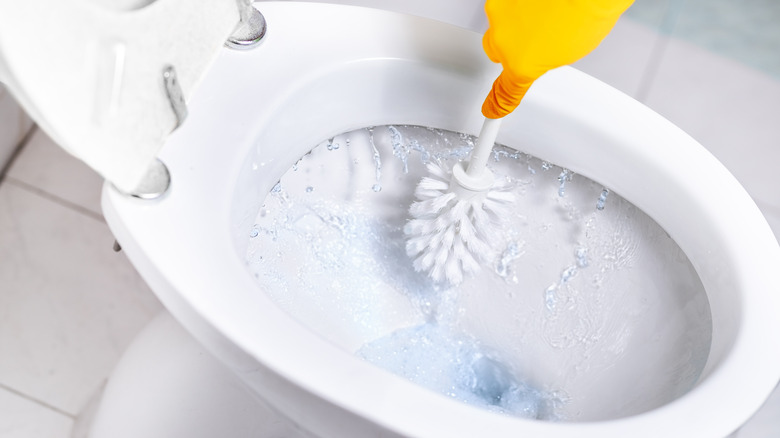 cleaning toilet