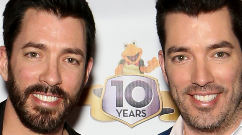 Drew and Jonathan Scott smiling